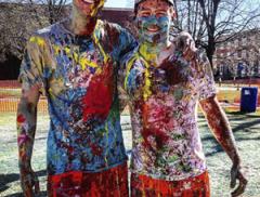 Eddie Mueller and friend covered in paint.