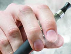 Hand holding e-cigarette 