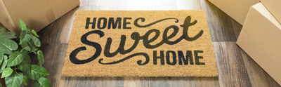 Door mat that says, Home Sweet Home